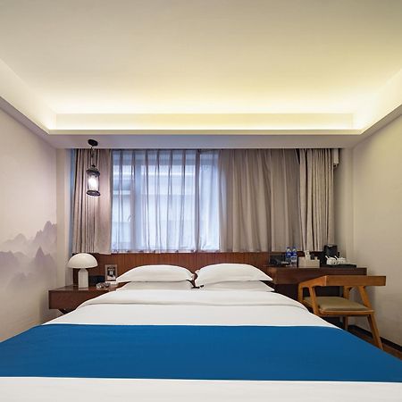 張家界武陵源北岸輕奢客棧 森林公園店 Hotel Жангжиаже Екстериор снимка